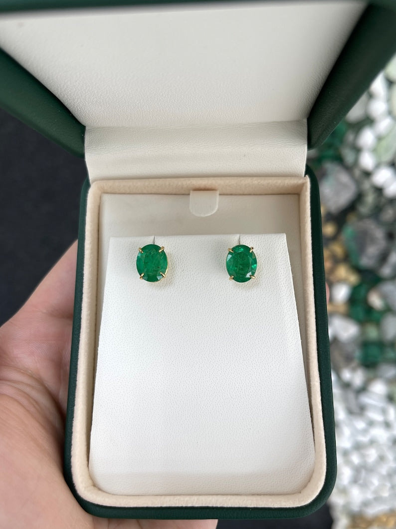 Colombian Emerald earrings with 4.85 carats total weight, 18K gold, vivid dark green oval cut emerald studs with four-prong claws