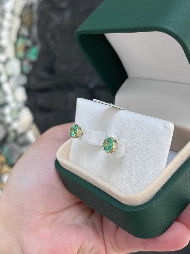 14K Colombian emerald round stud earrings with semi-bezel setting, totaling 2.0 carats, elegant jewelry from Colombian Emerald brand.