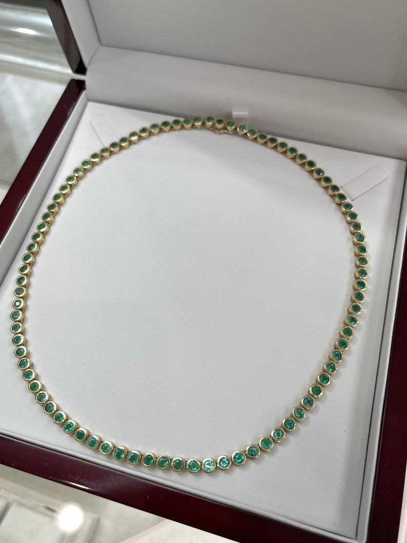 14K natural round green emerald tennis necklace with bezel setting, 25.50 tcw Colombian emeralds on a sleek chain.