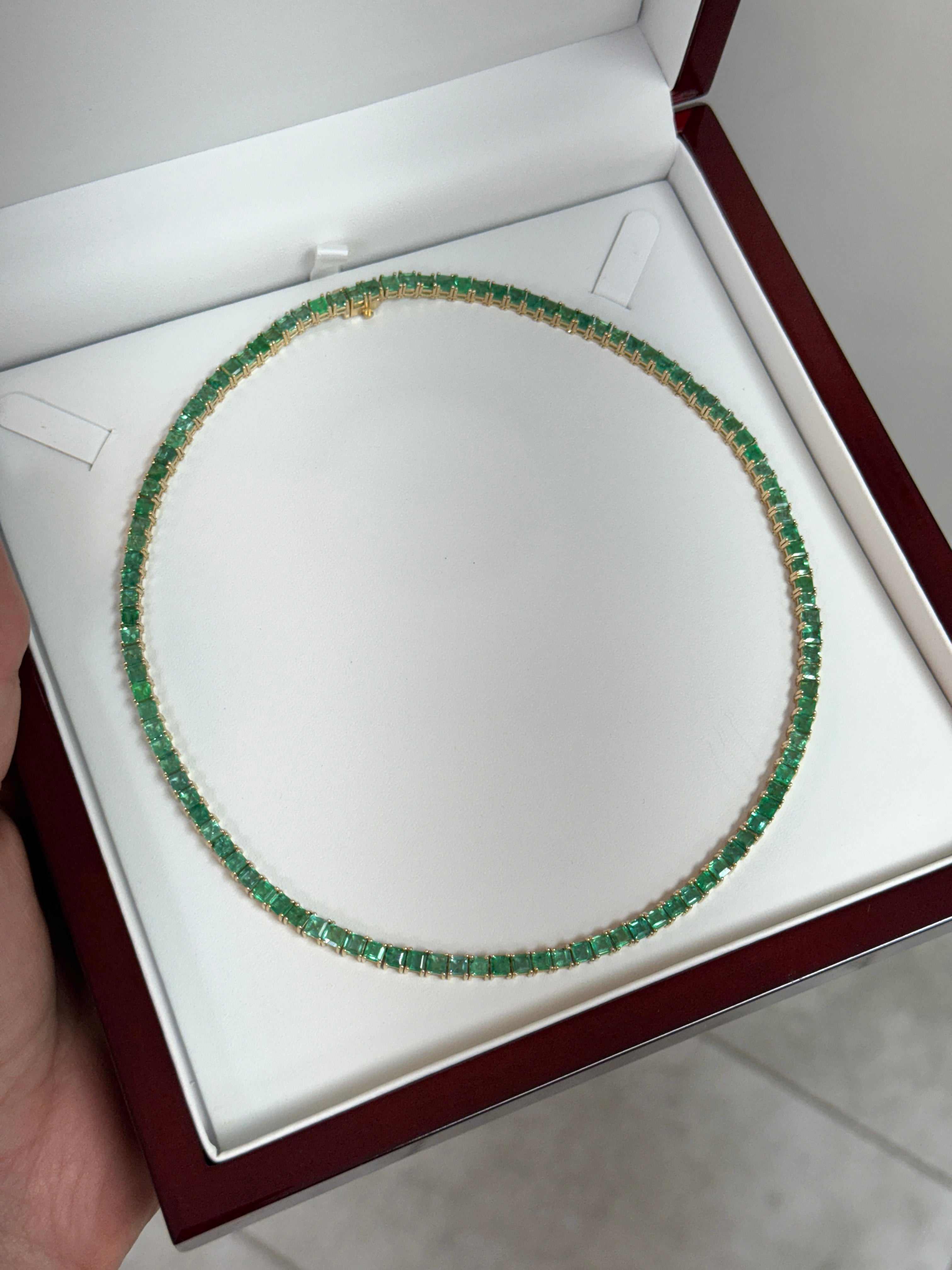Colombian Emerald 14K gold princess cut emerald necklace, 19-inch adjustable pendant with tennis-style design.