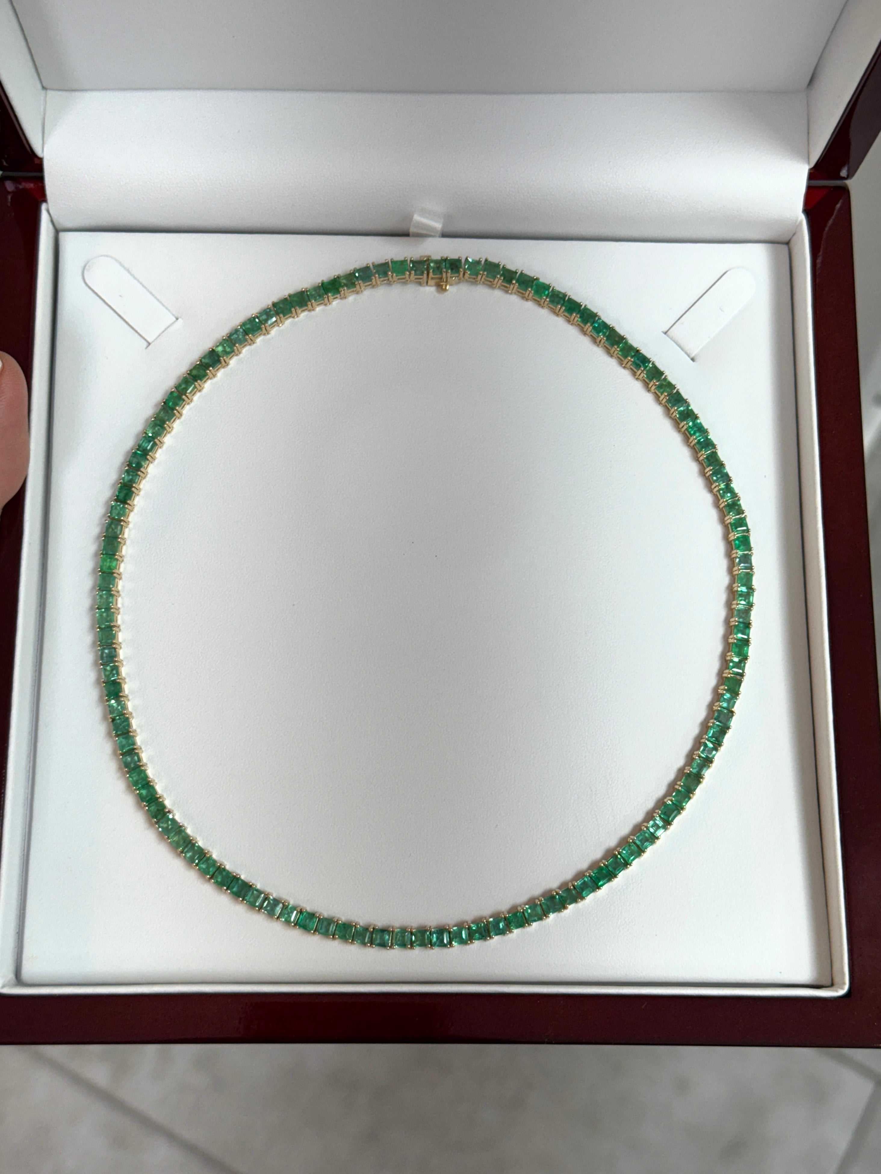 Colombian Emerald 19-inch princess cut emerald necklace in 14K gold, featuring a stunning adjustable tennis-style design.