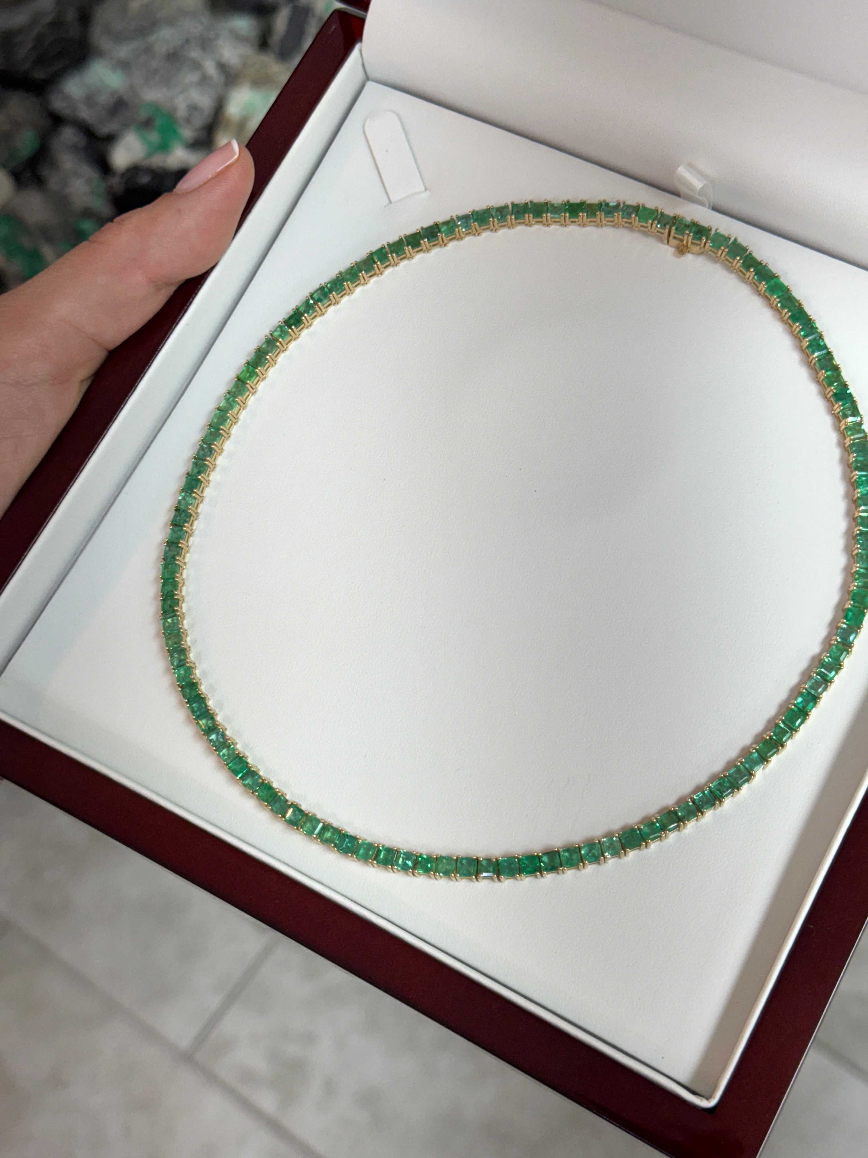 Colombian Emerald 14K gold princess cut emerald necklace, 19-inch adjustable pendant with tennis-style design.