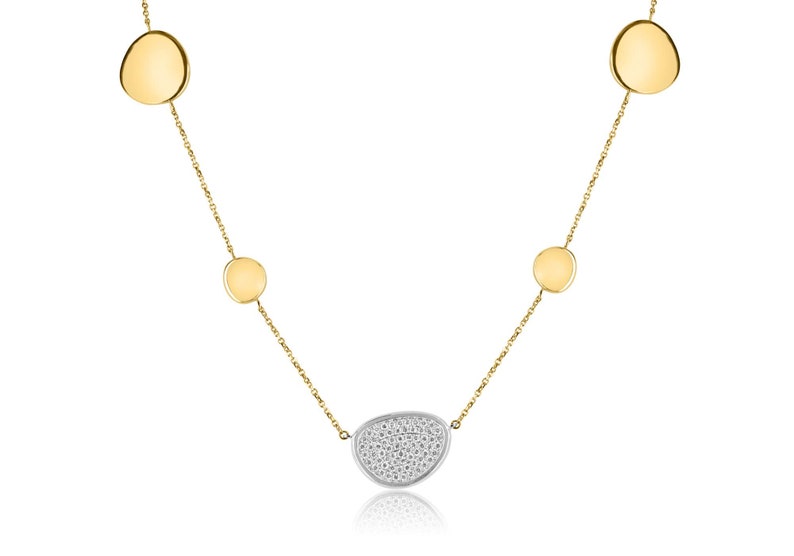 Colombian Emerald 14K white and yellow gold diamond cluster necklace with a semi-circle cable chain and brilliant round-cut diamonds.