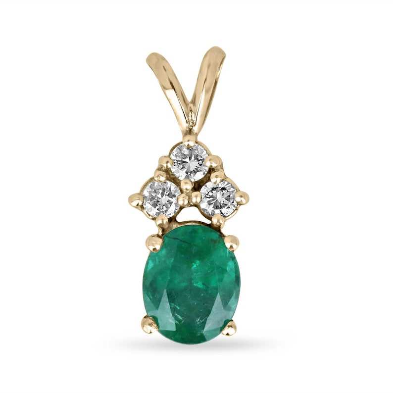 14K yellow gold pendant featuring a natural lush dark green oval cut emerald with three round diamond accents in a split bail setting