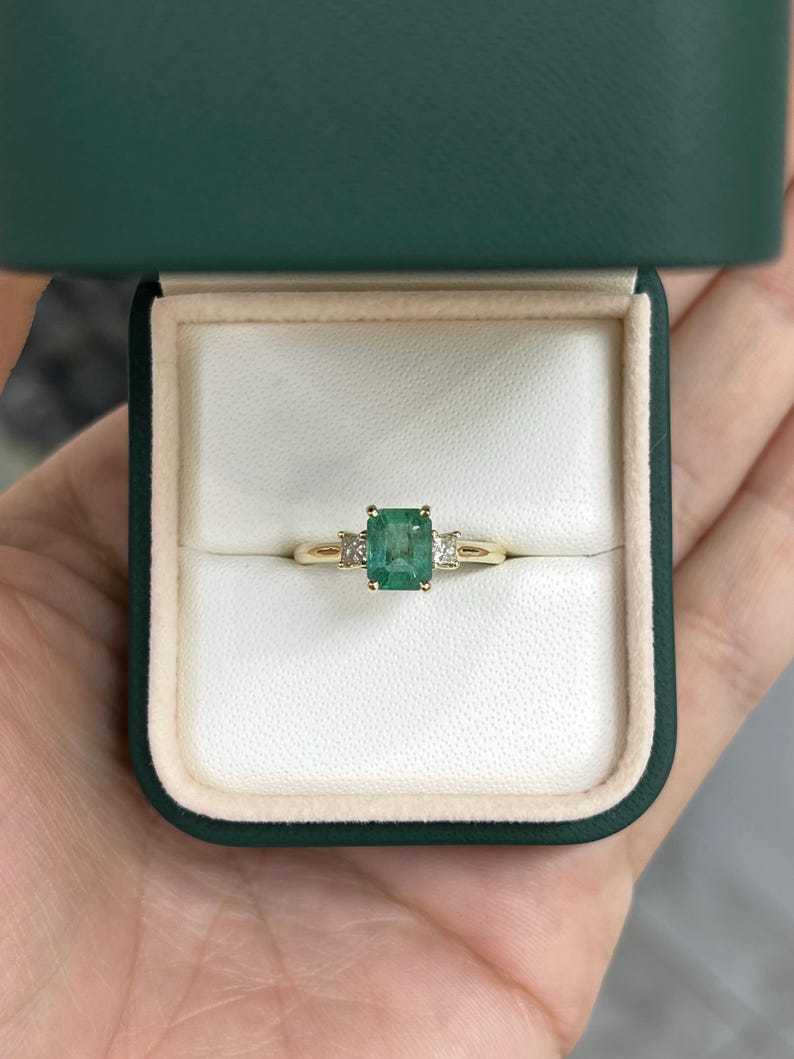 1.08tcw Emerald Cut & Diamond Three Stone May Birthstone Ring 14K