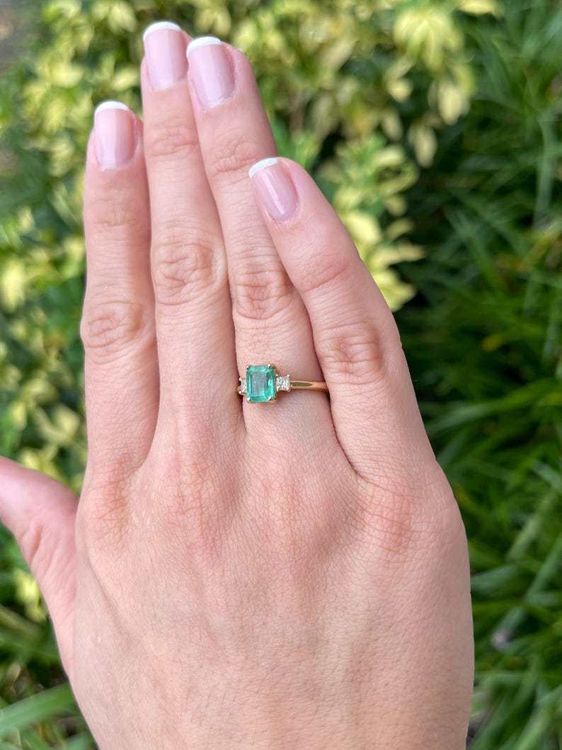 1.08tcw Emerald Cut & Diamond Three Stone May Birthstone Ring 14K