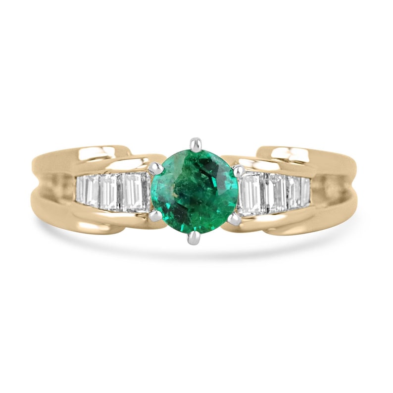 14K gold engagement ring with 1.25 carat Colombian emerald center stone and diamond baguette accents in a 6-prong setting