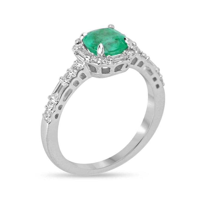 Colombian Emerald 14K gold engagement ring with a 1.55tcw vivid green cushion cut emerald and diamond halo with round baguette diamonds