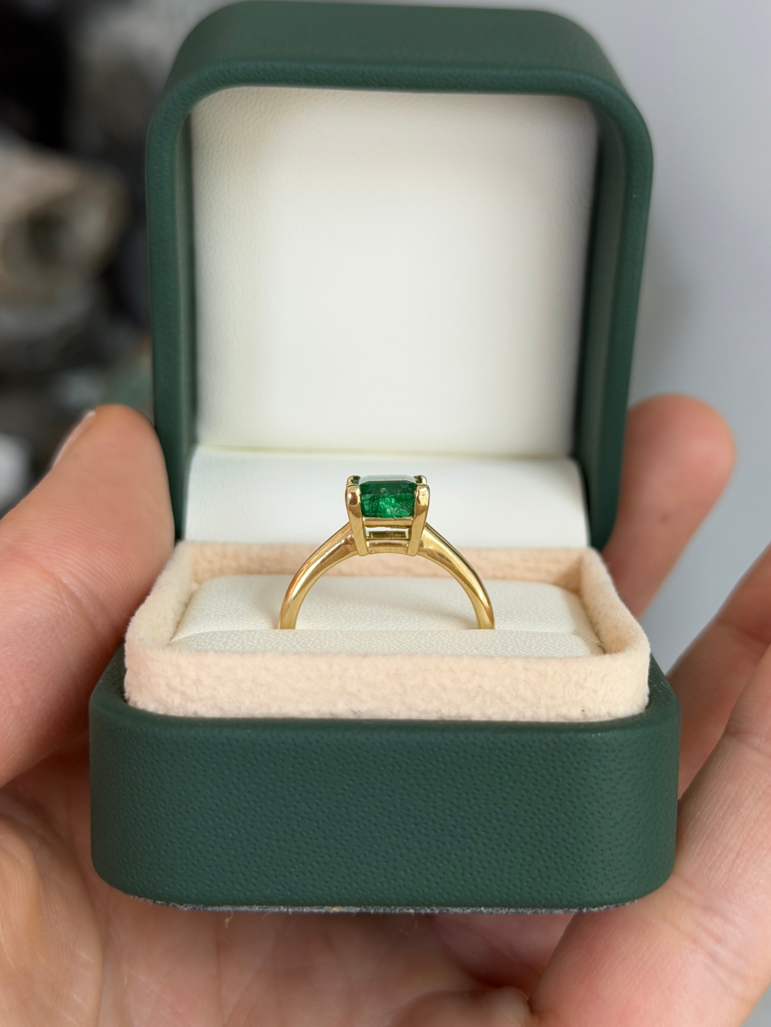 Deep green 1.99ct Asscher cut emerald solitaire engagement ring with V prong setting in 14K gold by Colombian Emerald.
