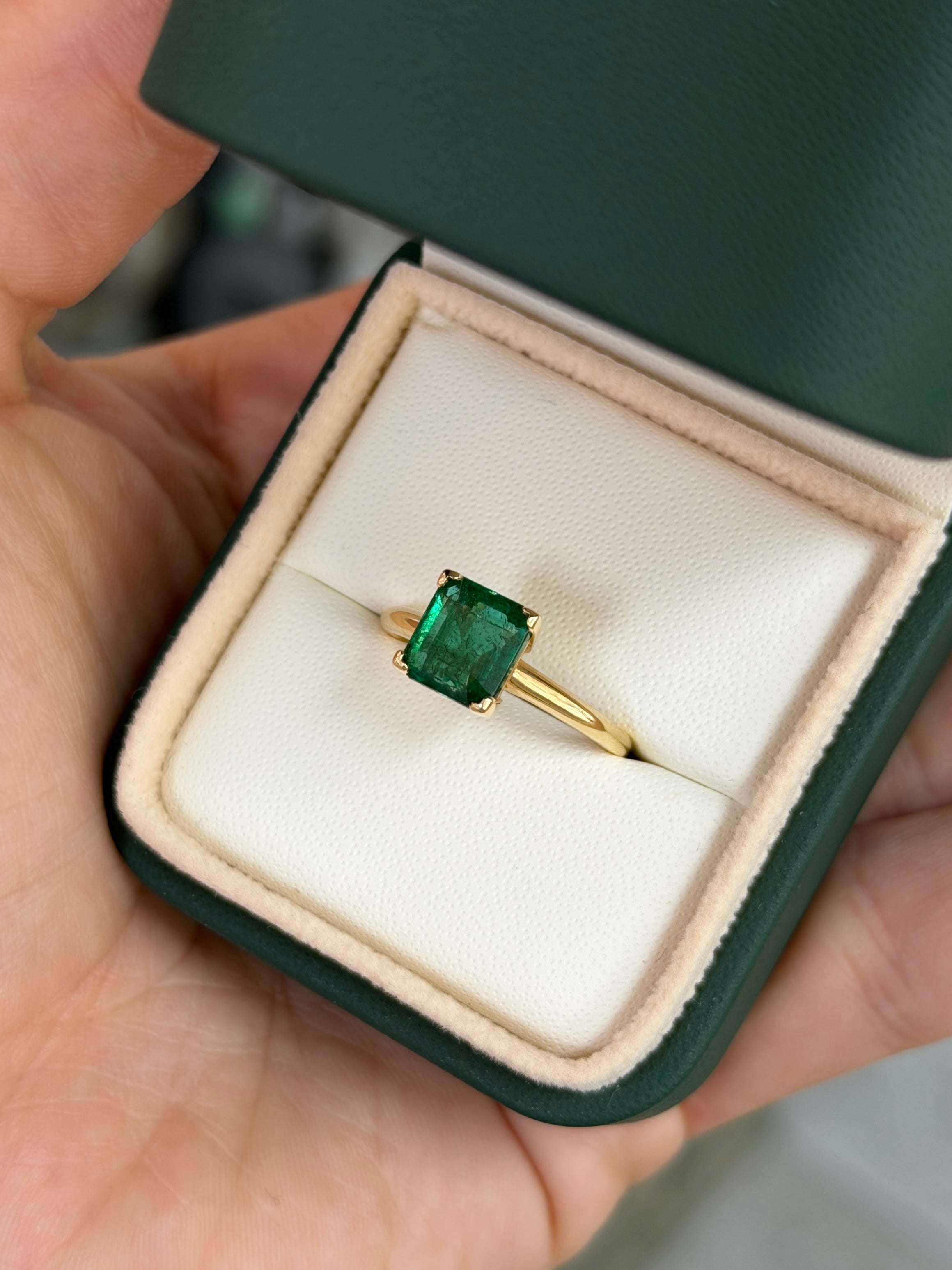 Deep green 1.99ct Asscher cut emerald solitaire engagement ring with V prong setting in 14K gold by Colombian Emerald.