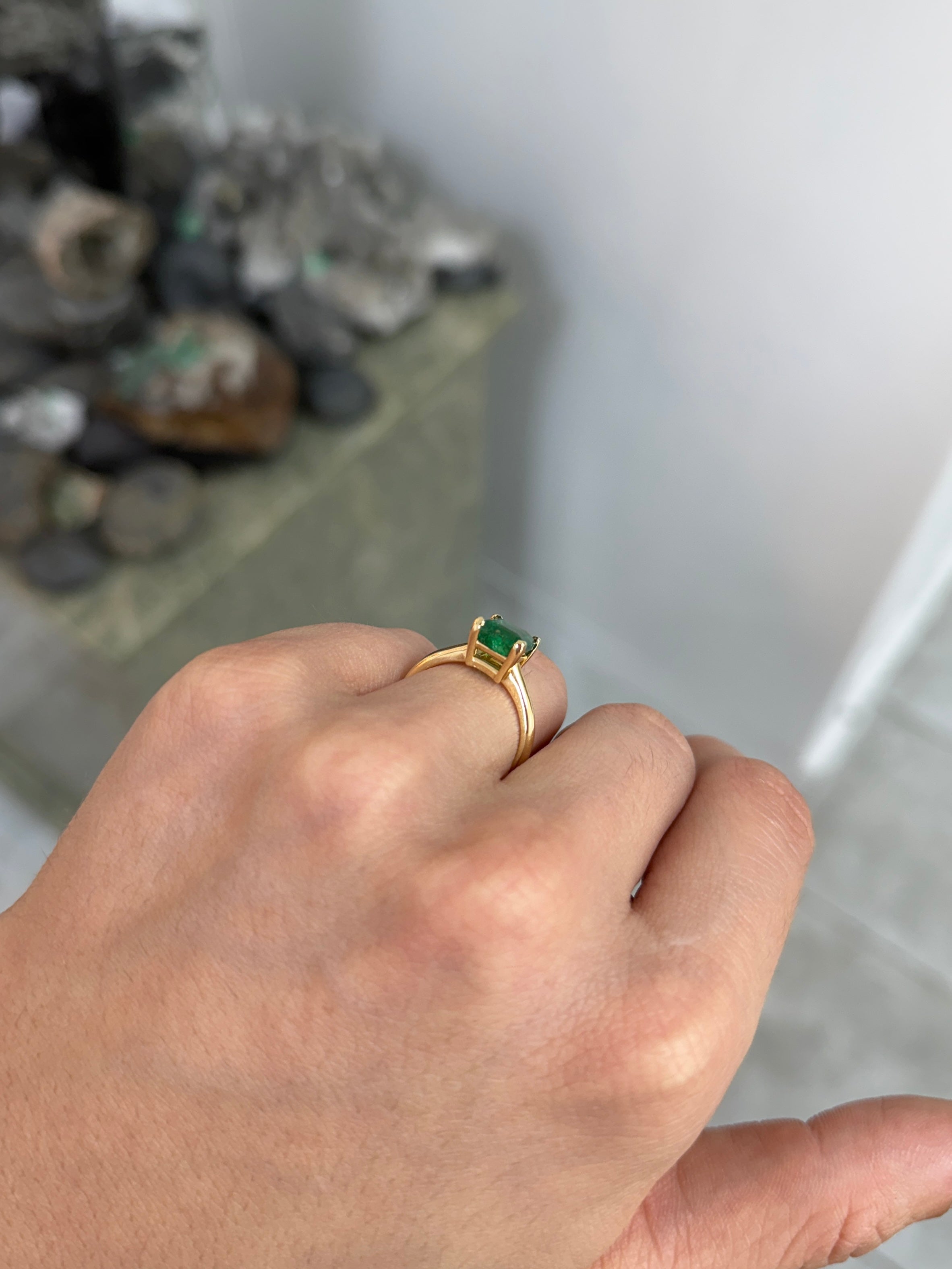 Deep green 1.99ct Asscher cut emerald solitaire engagement ring with V-prong setting in 14K gold by Colombian Emerald.