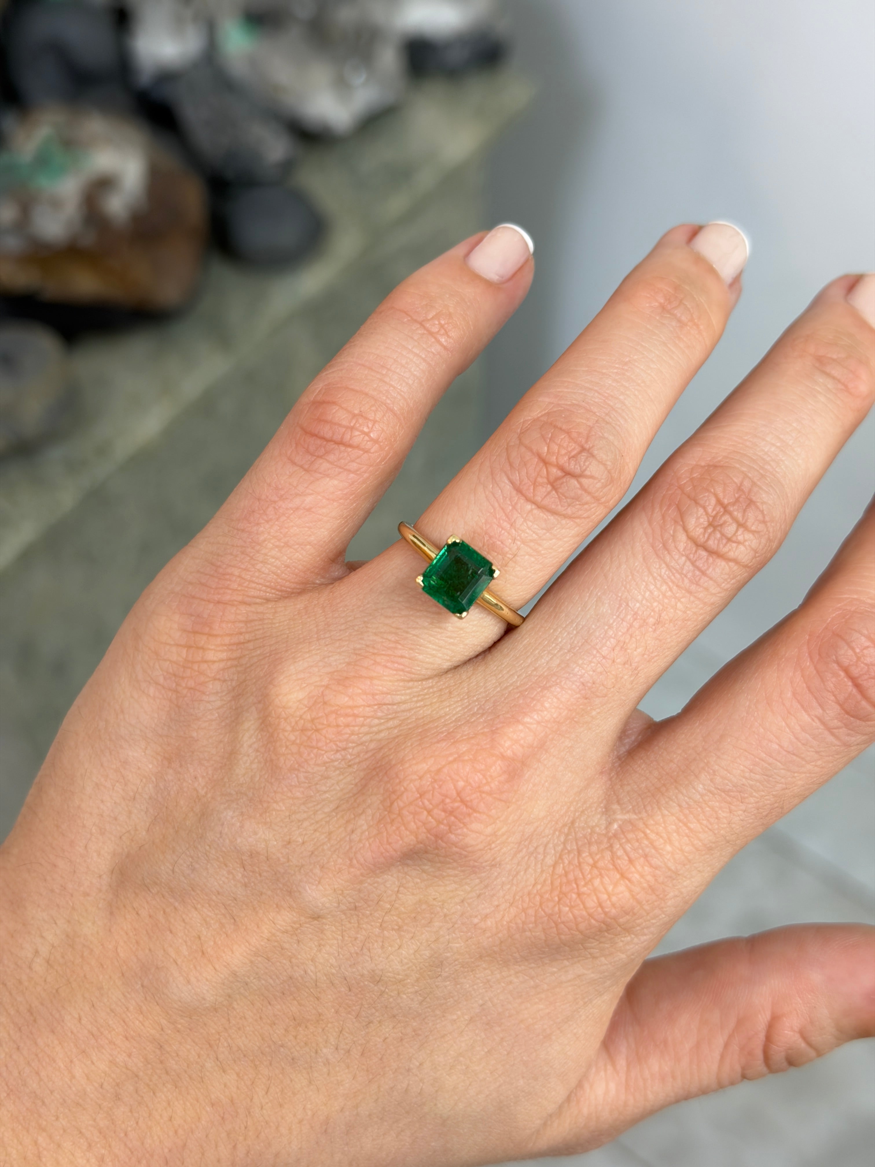 Deep green 1.99ct Asscher cut emerald solitaire engagement ring with V prongs in 14K gold by Colombian Emerald.