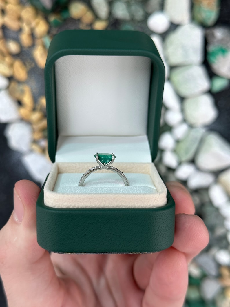 14K gold engagement ring with 1.60 carat East-to-West Zambian emerald and diamond accents, from Colombian Emerald.