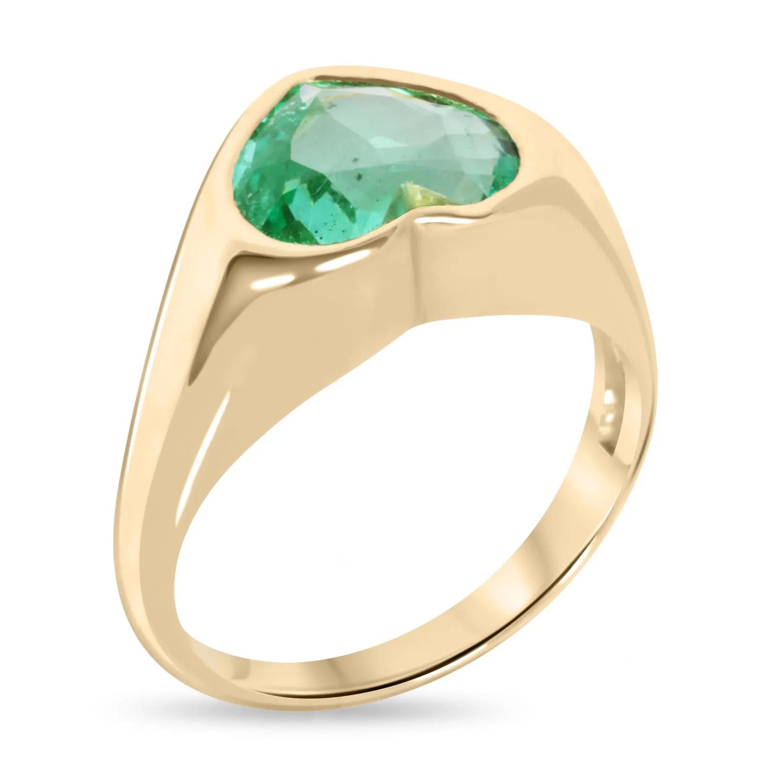 18K gold engagement ring with a heart-cut Colombian emerald bezel setting, designed for Nabil and Tara.