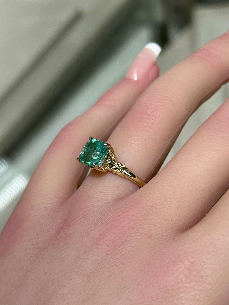 14K Floral Gold Solitaire Ring Featuring a 2.37ct Emerald in Four-Prong Design