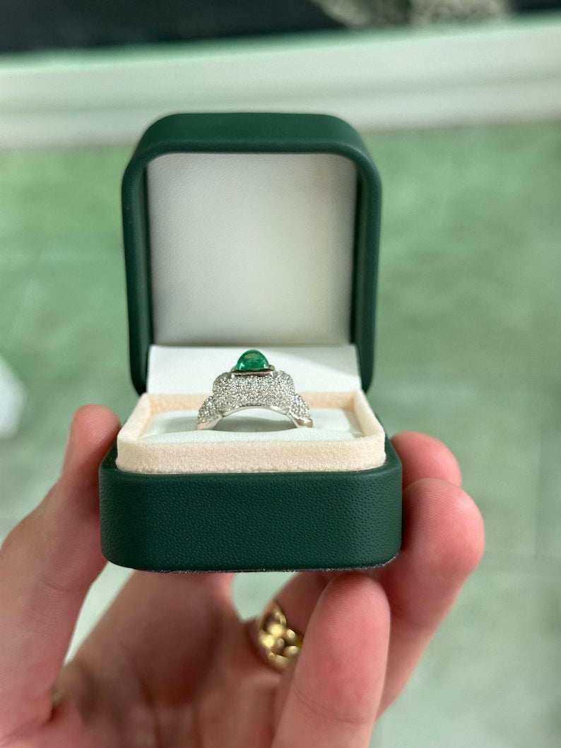 Natural Colombian emerald cluster engagement ring with diamond accents in 14K gold, featuring a sugarloaf emerald centerpiece.