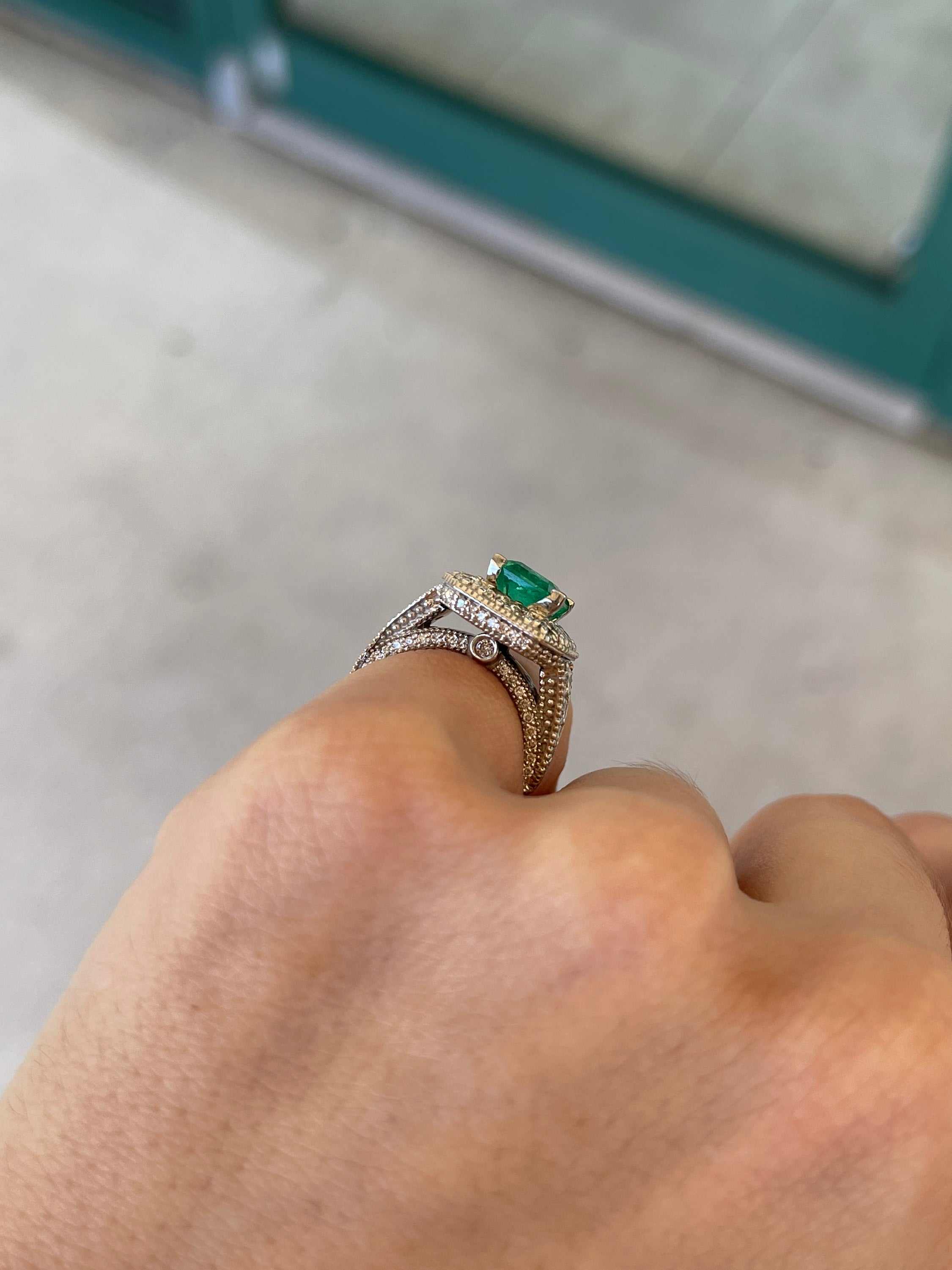 AAA quality vivid green emerald cut diamond halo accent engagement ring in 14K gold, featuring a 3.08tcw Colombian Emerald.