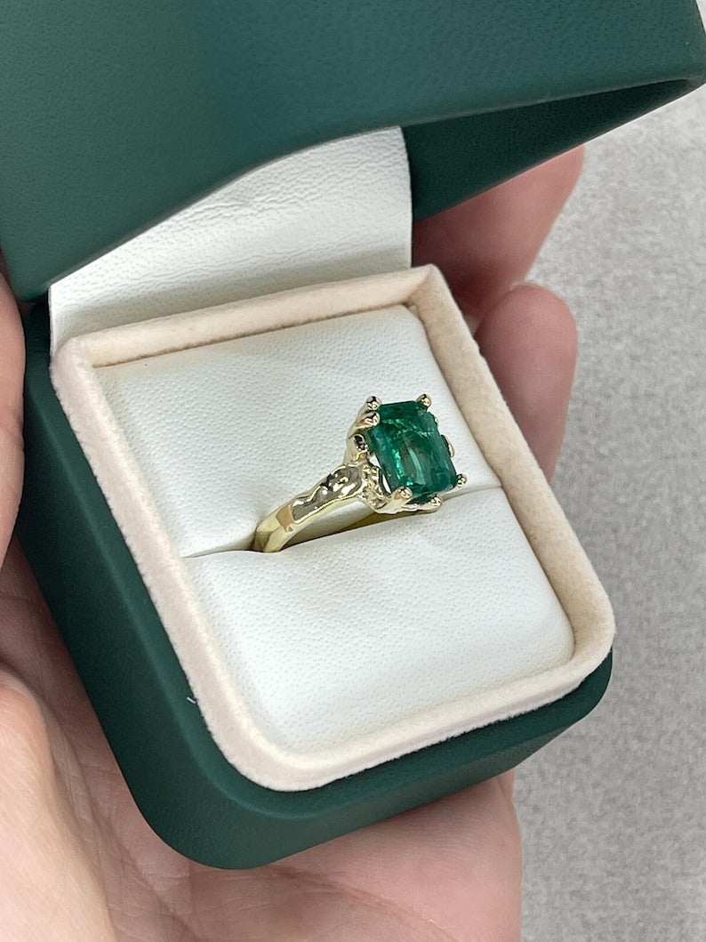 14K gold emerald engagement ring featuring a 3.10ct lush green Colombian emerald solitaire with organic gold nugget design.