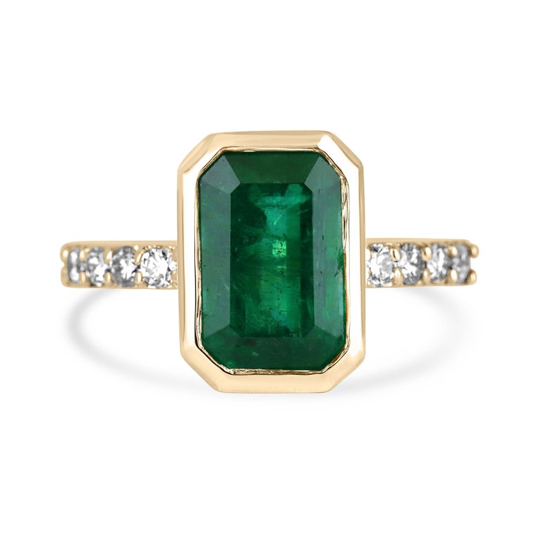 Green emerald cut engagement ring with diamond accents in 14K gold, featuring a 3.59 tcw Colombian emerald.