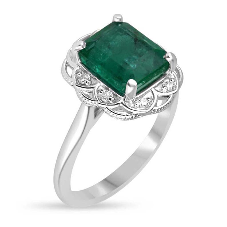 14K white gold engagement ring featuring 3.60tcw green emerald and diamond floral design by Colombian Emerald