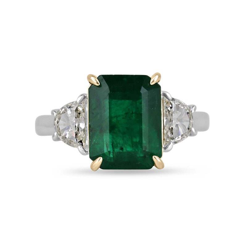4.79tcw dark green emerald emerald-cut three stone ring with VVS diamonds in 18K yellow gold and platinum setting