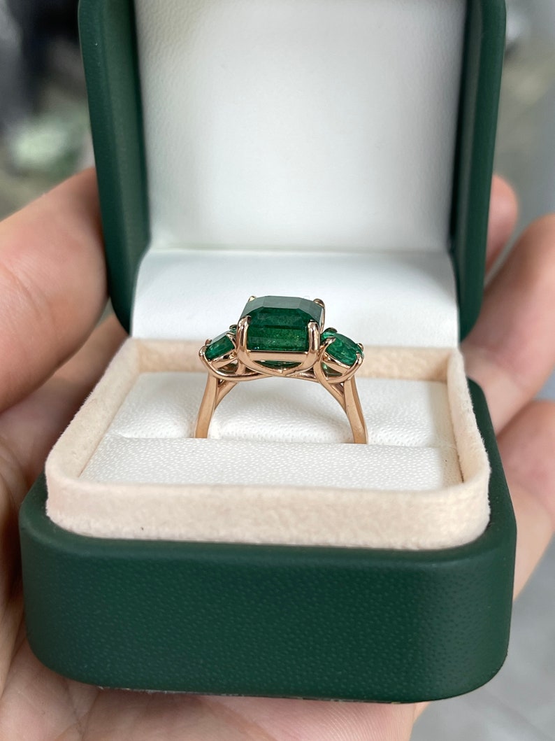 6.98tcw Dark Green Emerald Cut & Round Trilogy Three Stone Engagement ring 14K Rose - JR Colombian Emeralds