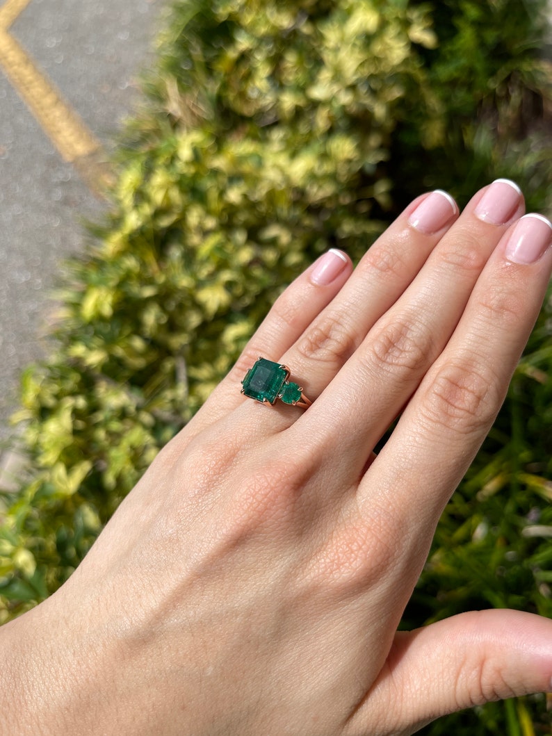 6.98tcw Dark Green Emerald Cut & Round Trilogy Three Stone Engagement ring 14K Rose - JR Colombian Emeralds