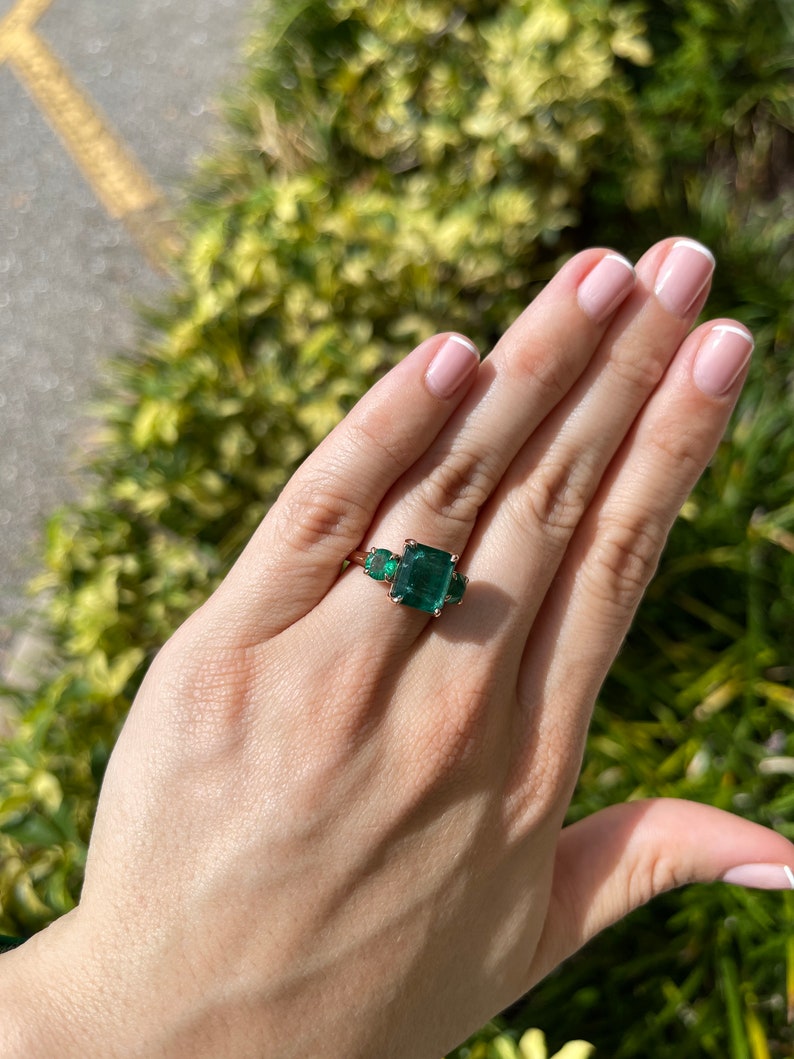 6.98tcw Dark Green Emerald Cut & Round Trilogy Three Stone Engagement ring 14K Rose - JR Colombian Emeralds