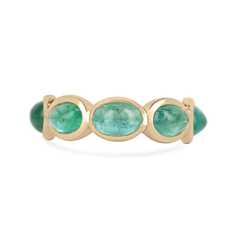 Ladies Colombian Emerald wedding band in 14K yellow gold with 3.60 carats east-to-west oval cabochon cut emeralds, size 5.25.