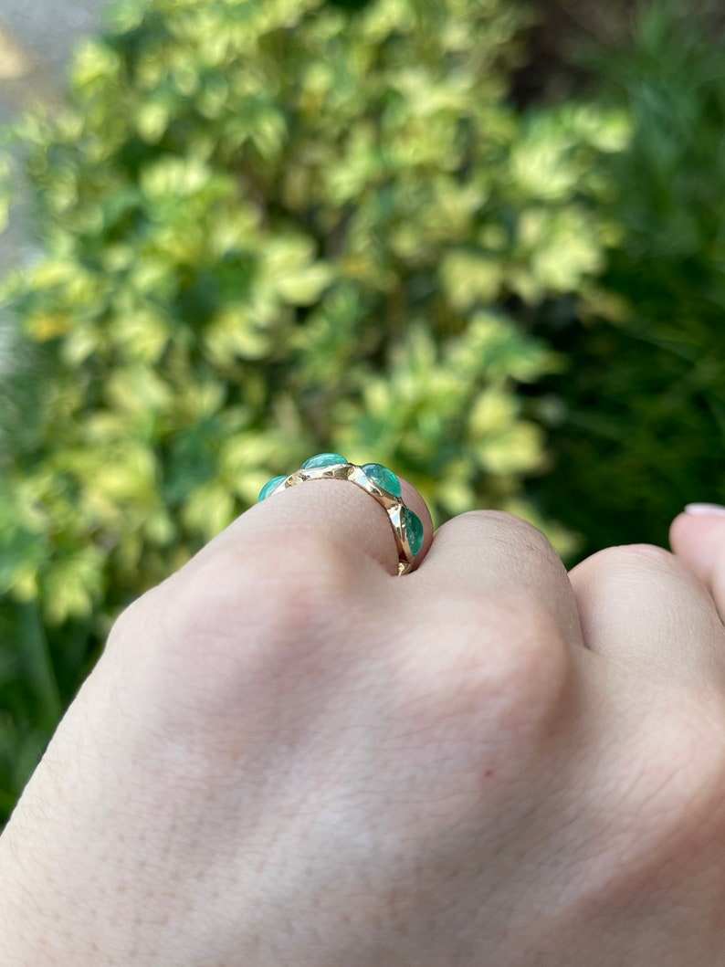 Ladies Colombian emerald wedding band with 3.60tcw east-to-west oval cabochon cut emeralds in 14K yellow gold, size 5.25