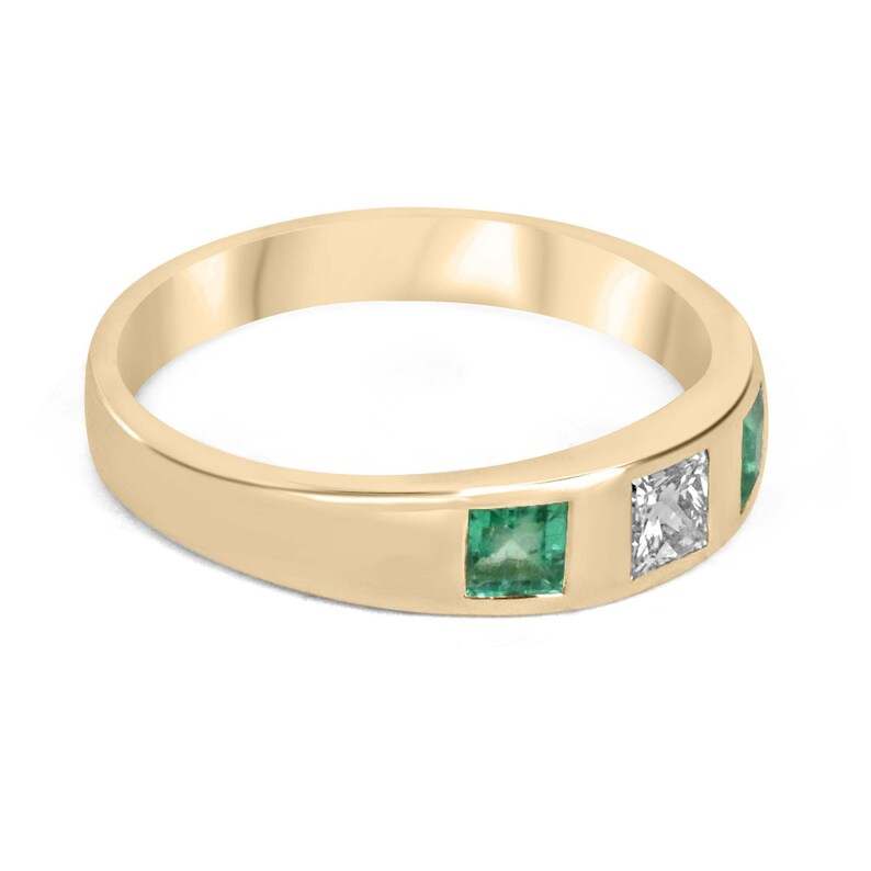 Ladies emerald ring with a 0.68tcw vivid green diamond and emerald in a princess cut band, crafted in 14K gold by Colombian Emerald.