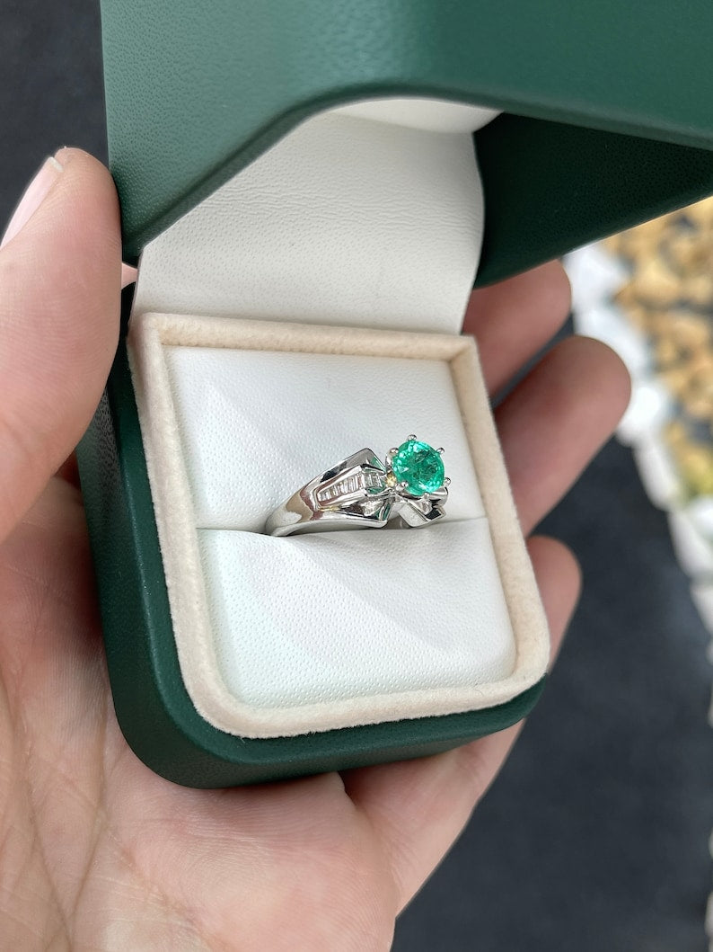 Colombian Emerald ladies ring with 1.25tcw round emerald, tapered baguette diamonds, 18K white gold, 6-prong setting