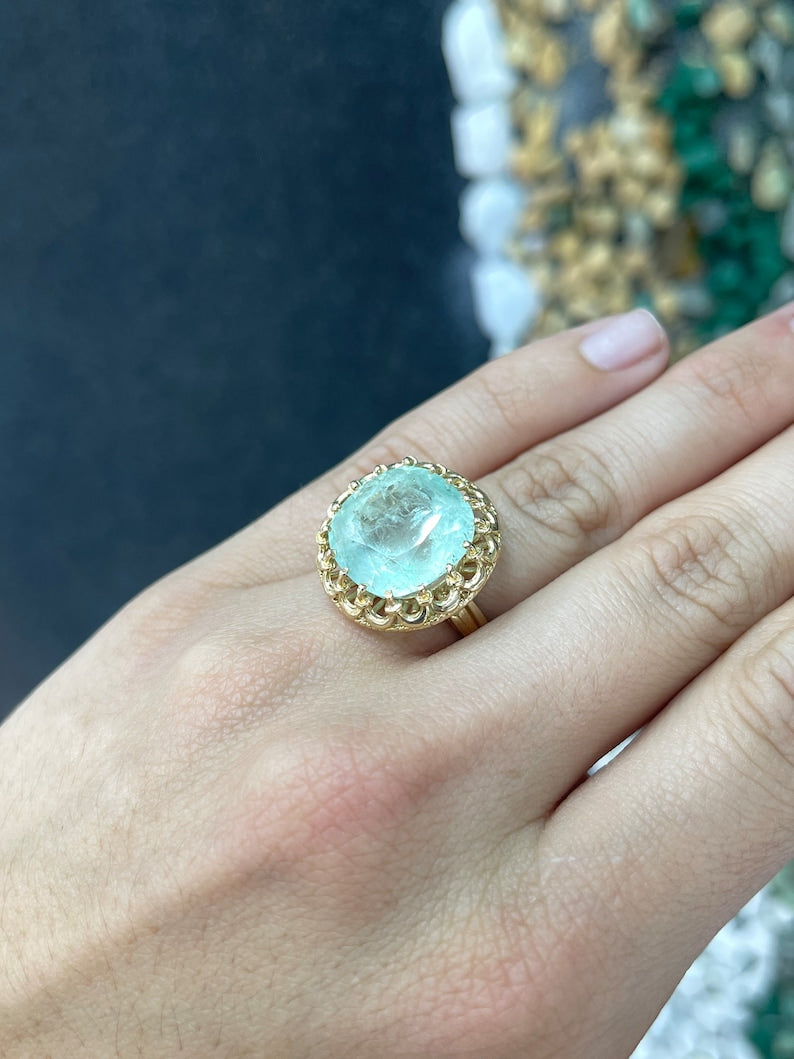 Large 16.75ct pale light green cushion cut emerald ladies ring by Colombian Emerald, vintage-inspired antique style.