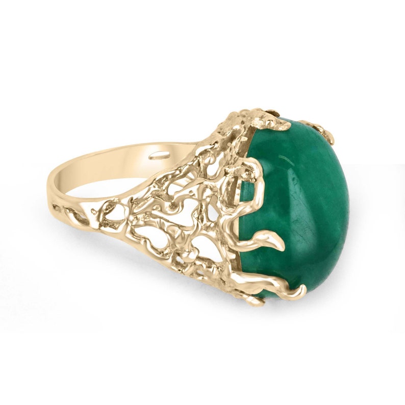14K gold oval cut emerald solitaire unisex ring with intricate design and prong setting, featuring Colombian emeralds.