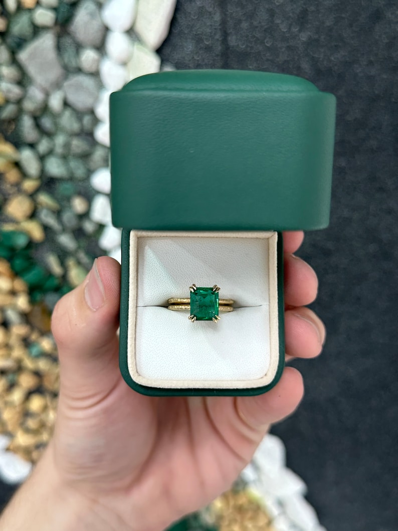 Ladies emerald ring featuring a 3.43ct earth mined emerald, hammered 14K gold split shank solitaire from Colombian Emerald.