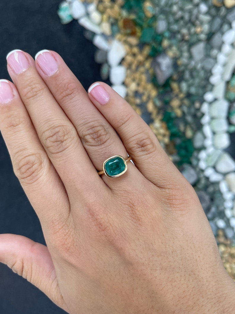 Deep ocean green cushion cut emerald engagement ring in 14K gold, Colombian Emerald ladies jewelry with intricate detailing.