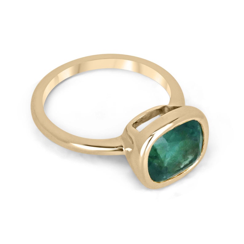 Ladies 14K gold emerald engagement ring with a 3.83ct deep ocean green cushion cut Colombian emerald.