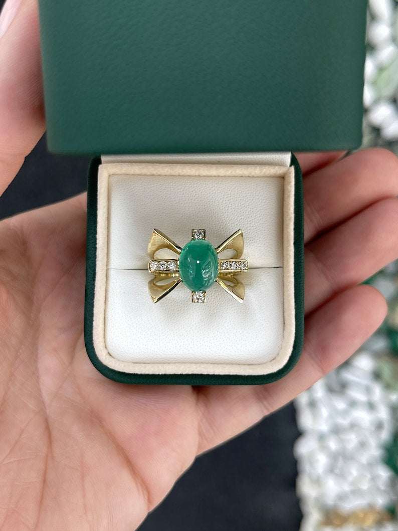 Ladies emerald ring with 5.12 carats of green cabochon emeralds, diamond accents, gold star design, Colombian Emerald brand.