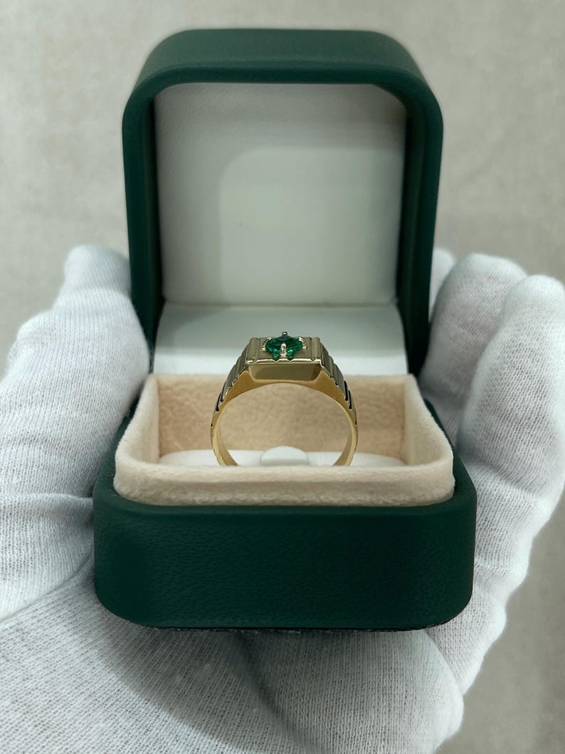 Mens pinky ring with 0.60ct emerald cut rich green emerald solitaire in 14K gold from Colombian Emerald.