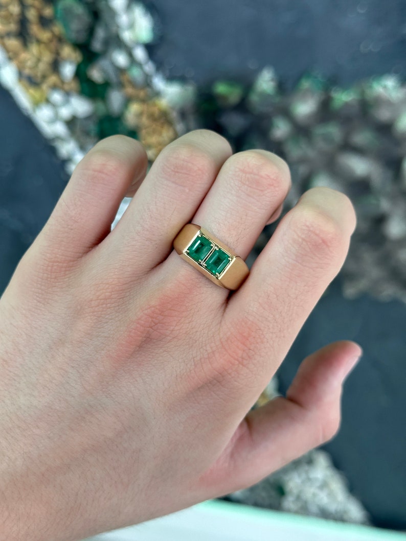 Double emerald men's ring with 2.03 carats in 14K gold bezel setting, unisex Colombian Emerald brand jewelry.