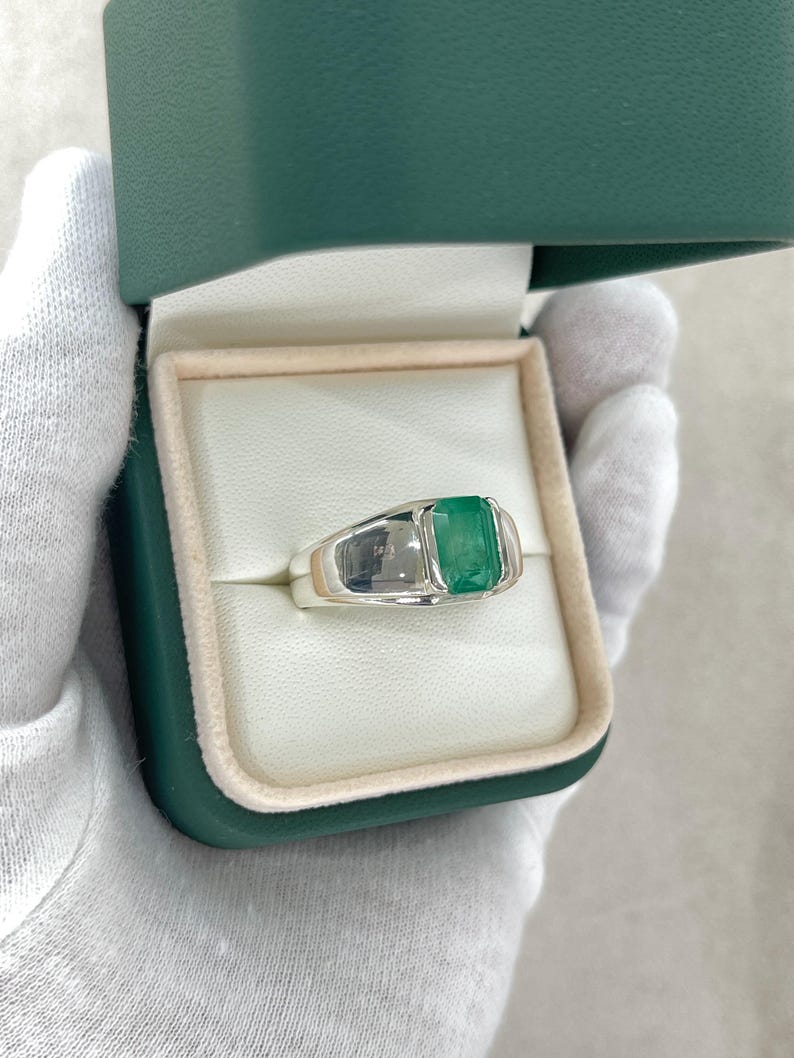 Natural emerald cut 2.75 carat men's silver ring with half bezel channel setting by Colombian Emerald.