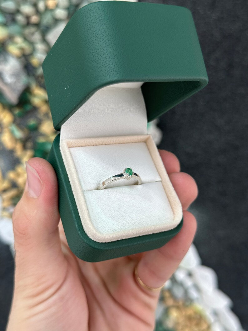 Sterling silver 925 necklace with a petite pear-shaped vivid green emerald pendant, showcasing Colombian Emerald craftsmanship.