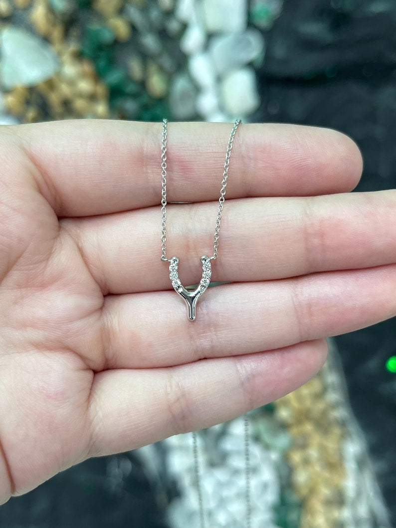 14K gold Y-shaped horse shoe diamond pendant necklace with white gold finish, featuring 0.10 carats of diamonds from Colombian Emerald.
