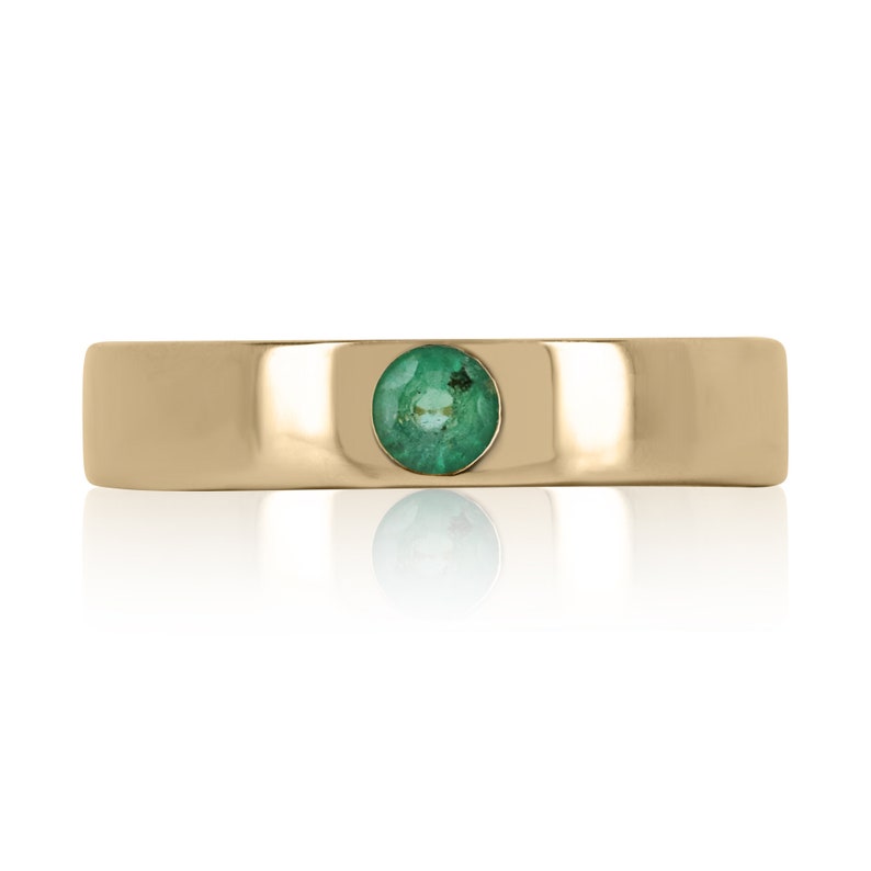 0.10ct solitaire round emerald pinky band ring in 14K gold.
