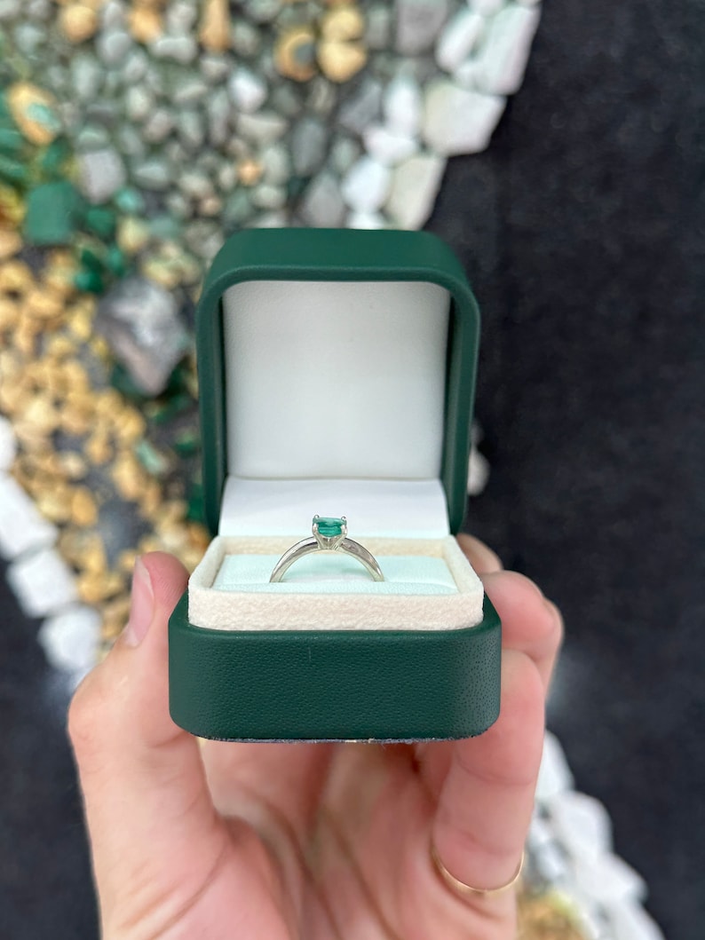Sterling silver ring featuring a 0.90 carat natural spring green Asscher cut emerald solitaire from Colombian Emerald.