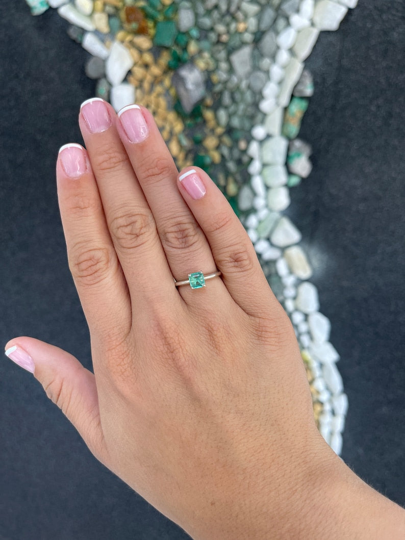 Sterling silver ring featuring a 0.90 carat natural spring green Asscher cut emerald solitaire, designed by Colombian Emerald.