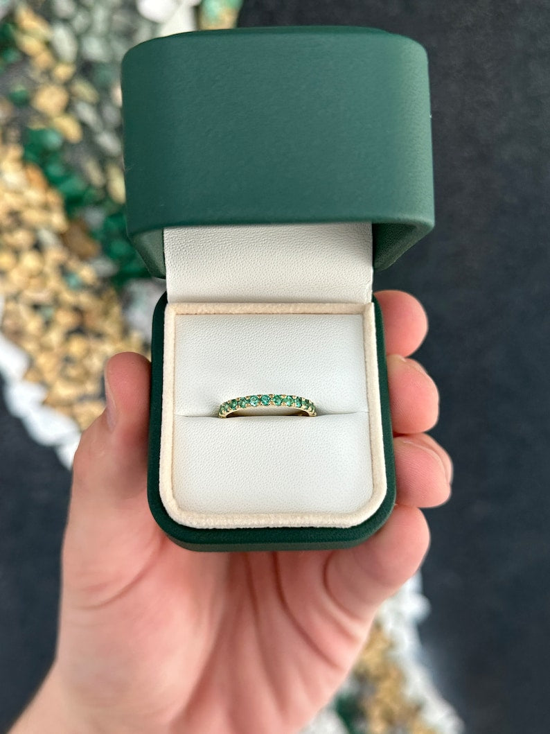 Medium dark green emerald half eternity band with round cut emeralds, 0.90tcw, set in 14K gold, from Colombian Emerald.