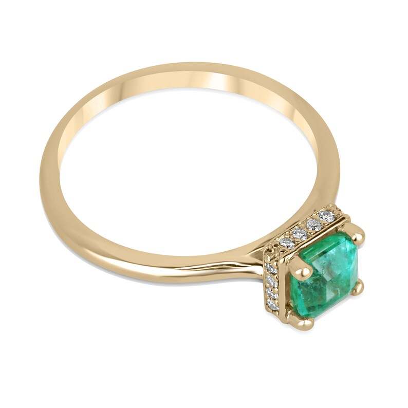 Natural Asscher emerald and hidden diamond halo solitaire ring in 14K gold, featuring a 0.96tcw center stone and elegant design.