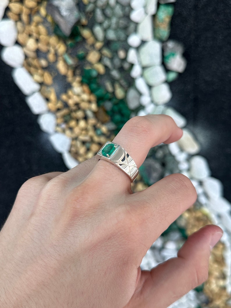 Sterling silver men's ring with a 1.13 carat lush green oval cut solitaire emerald from Colombian Emerald.