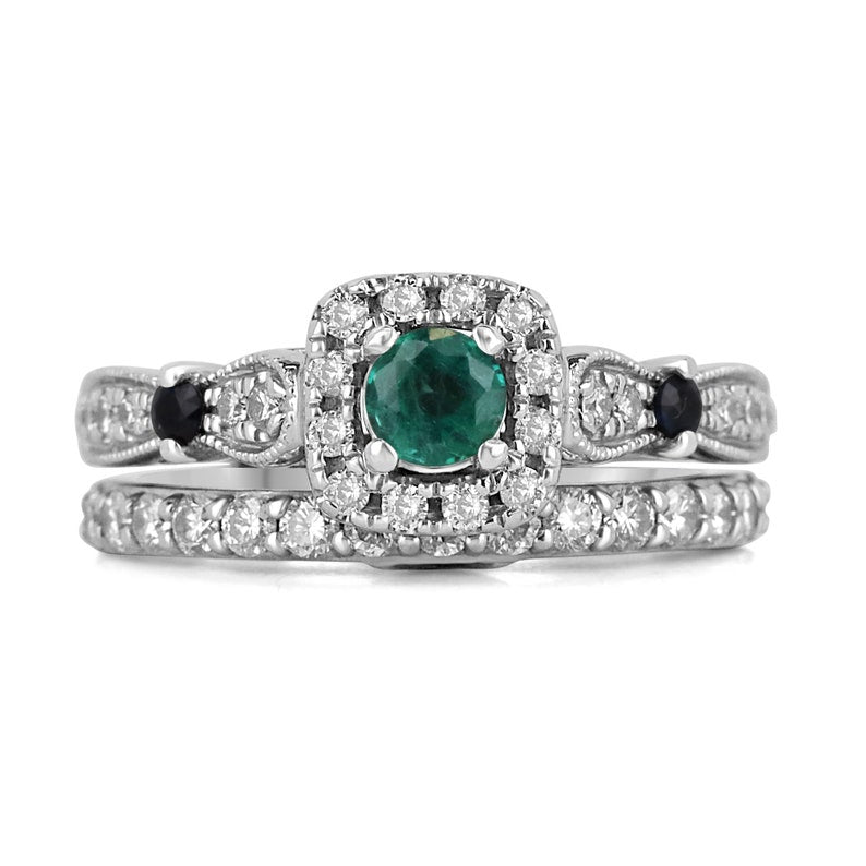 14K gold engagement ring with natural emerald, sapphire, and diamond accents, featuring intricate design by Colombian Emerald.